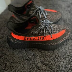 Yeezy Black and Orange Sneakers